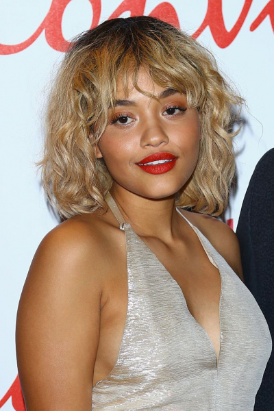 Kiersey Clemons shaggy blonde lob with bangs